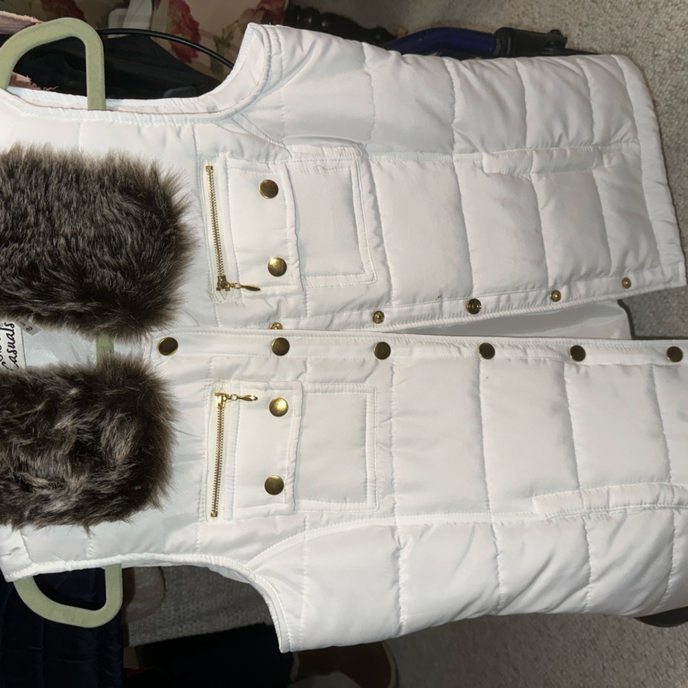 White puffy vest